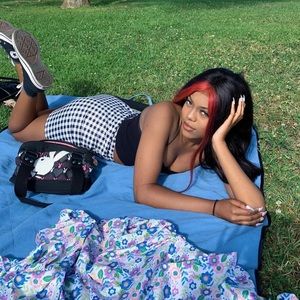 size small. fitted checker skirt. worn once for photo.